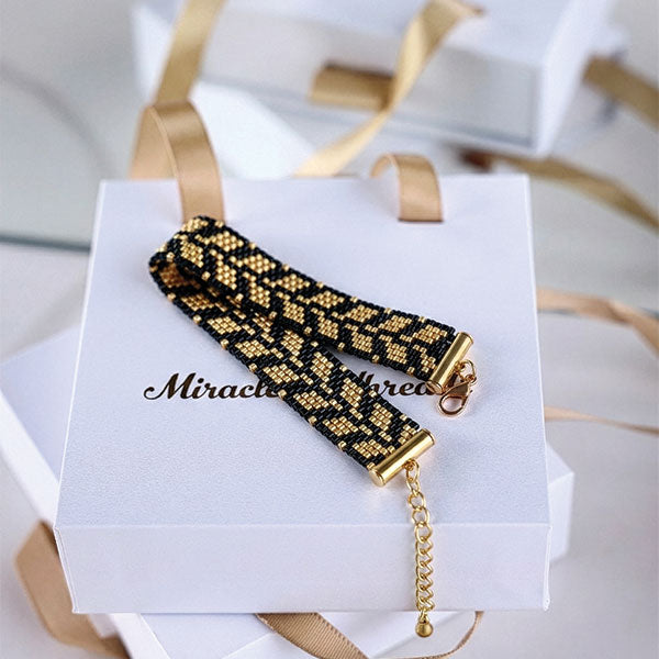 Handmade black Miyuki bead bracelet with 24K gold plated beads and gold clasp