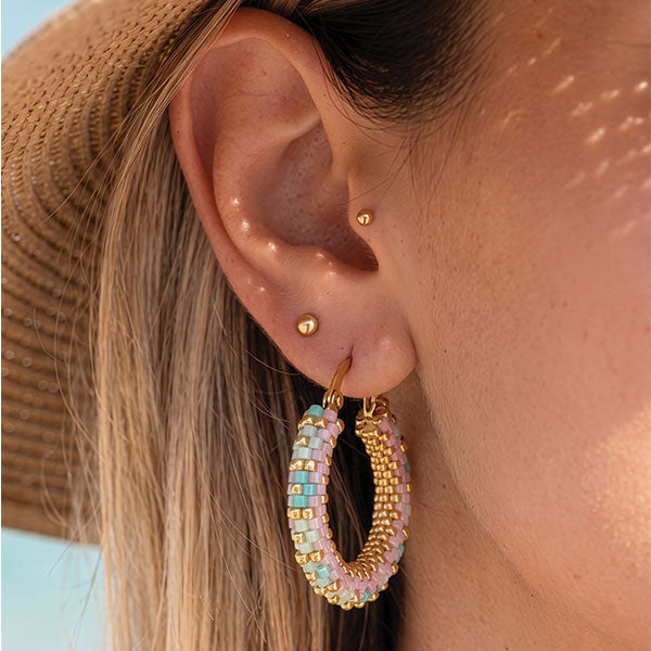 Handmade Miyuki bead hoop earrings in pastel turquoise, pink, ivory, and gold tones with 24K gold plated elements displayed in gift box