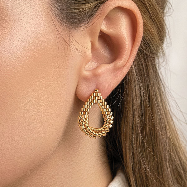 Handmade Miyuki bead earrings in gold teardrop shape with woven texture and 24K gold plated elements displayed in gift box