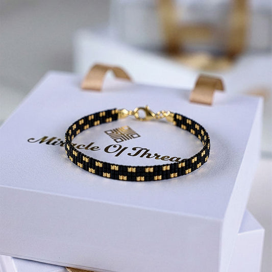 Handmade black Miyuki bead bracelet with 24K gold plated accents – Eclipse Noir design