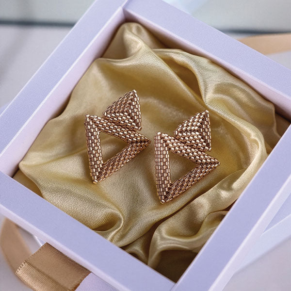 Handmade Miyuki bead triangle earrings in gold tone with geometric design and 24K gold plated elements displayed in gift box