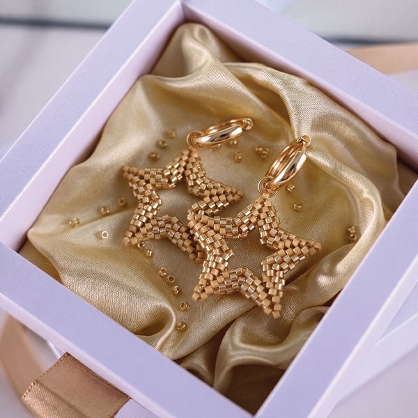 Handmade Miyuki bead star earrings in gold tones with layered geometric design and 24K gold plated elements