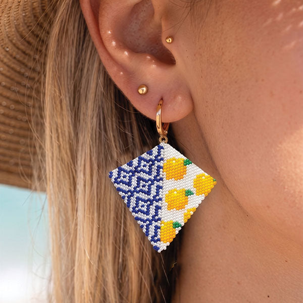Handmade Miyuki bead earrings with blue geometric pattern and yellow lemon motifs featuring 24K gold plated elements