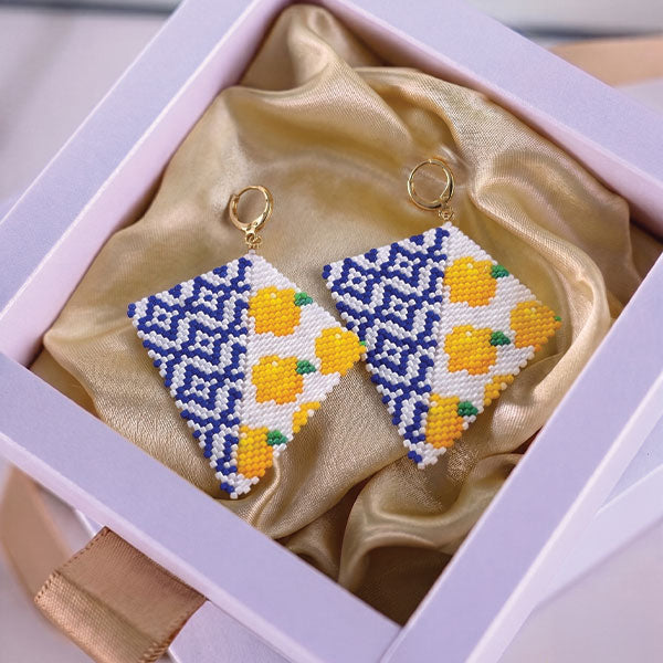 Handmade Miyuki bead earrings with blue geometric pattern and yellow lemon motifs featuring 24K gold plated elements