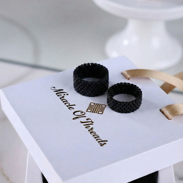 Handmade black Miyuki bead ring with minimal woven texture