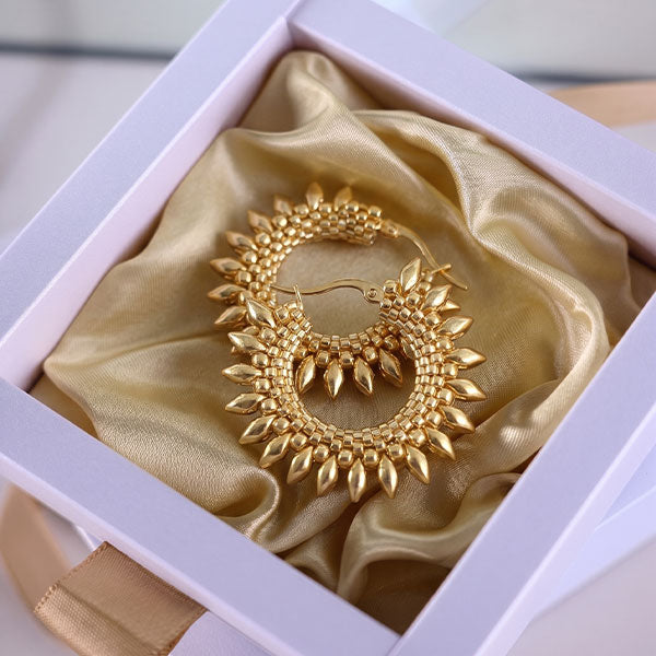 Handmade gold Miyuki bead hoop earrings with sunburst design and 24K gold plated details displayed in jewelry gift box